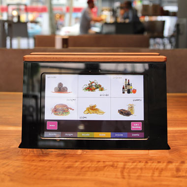Retractable e-menu in restaurant table