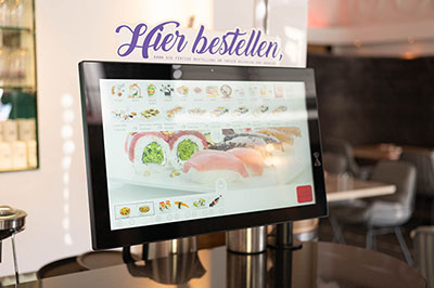 Self order terminal with sushi products in landscape format