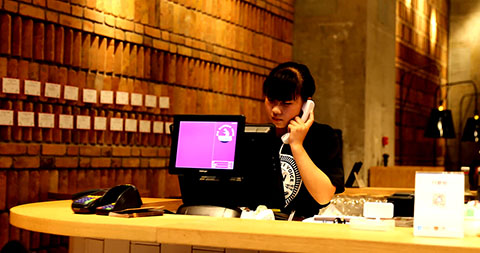 Hotel reception with staff